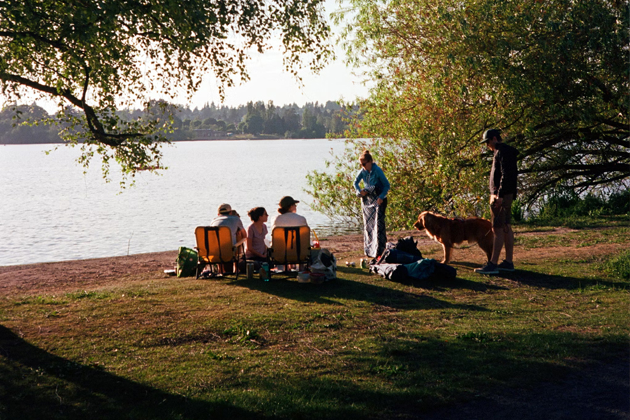 Parent relaxing with their family